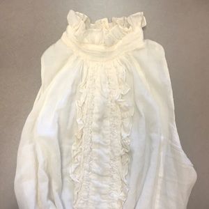 Cream ruffle sleeveless top